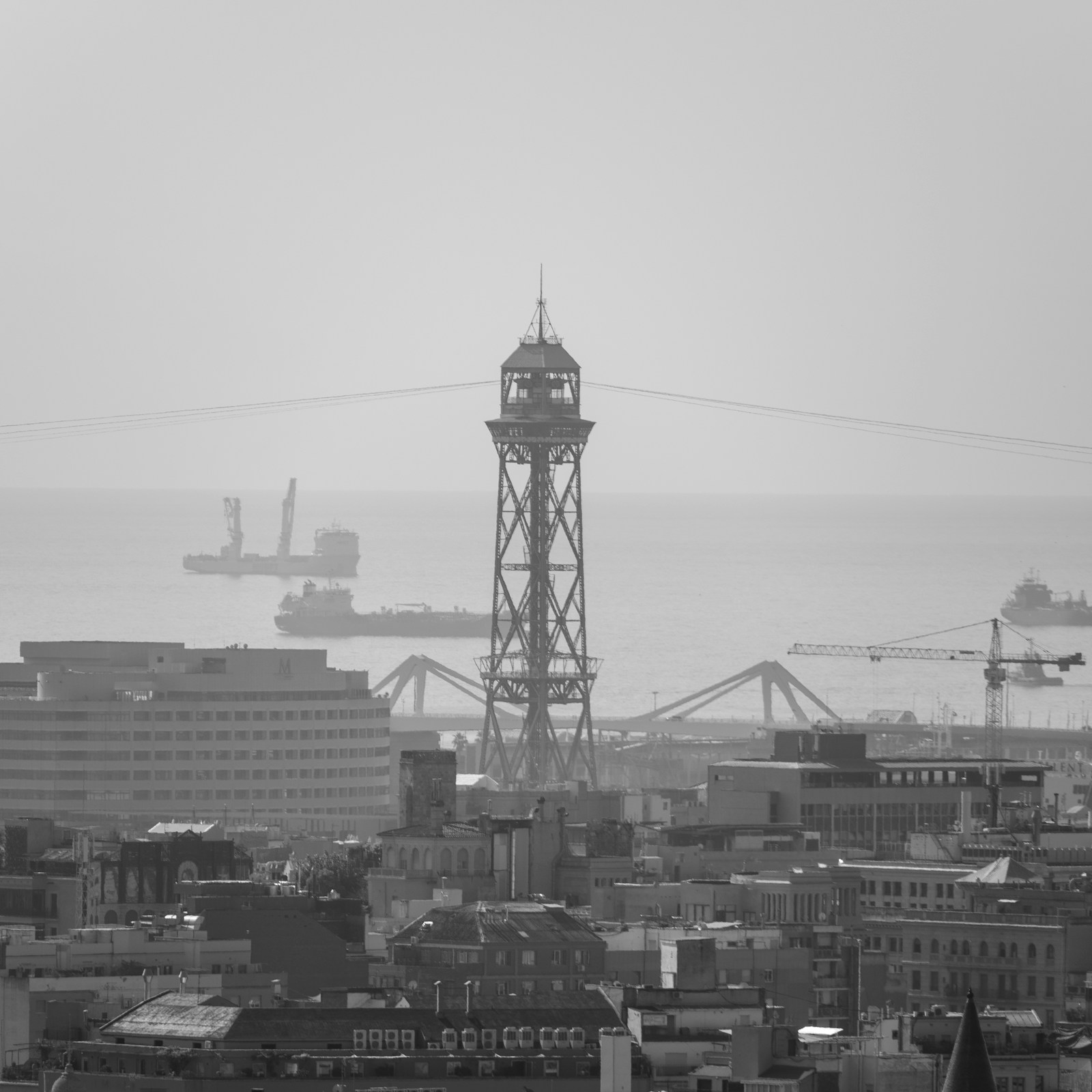 A black and white photo of a city skyline